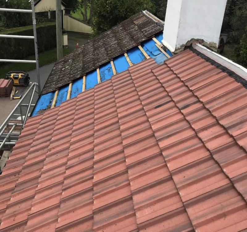 Roof underlay being laid on new decking