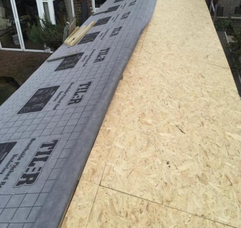 Finished slate roof installed by Safeshield in Surrey
